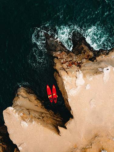 la jolla aerial photography of two red kayaks san diego